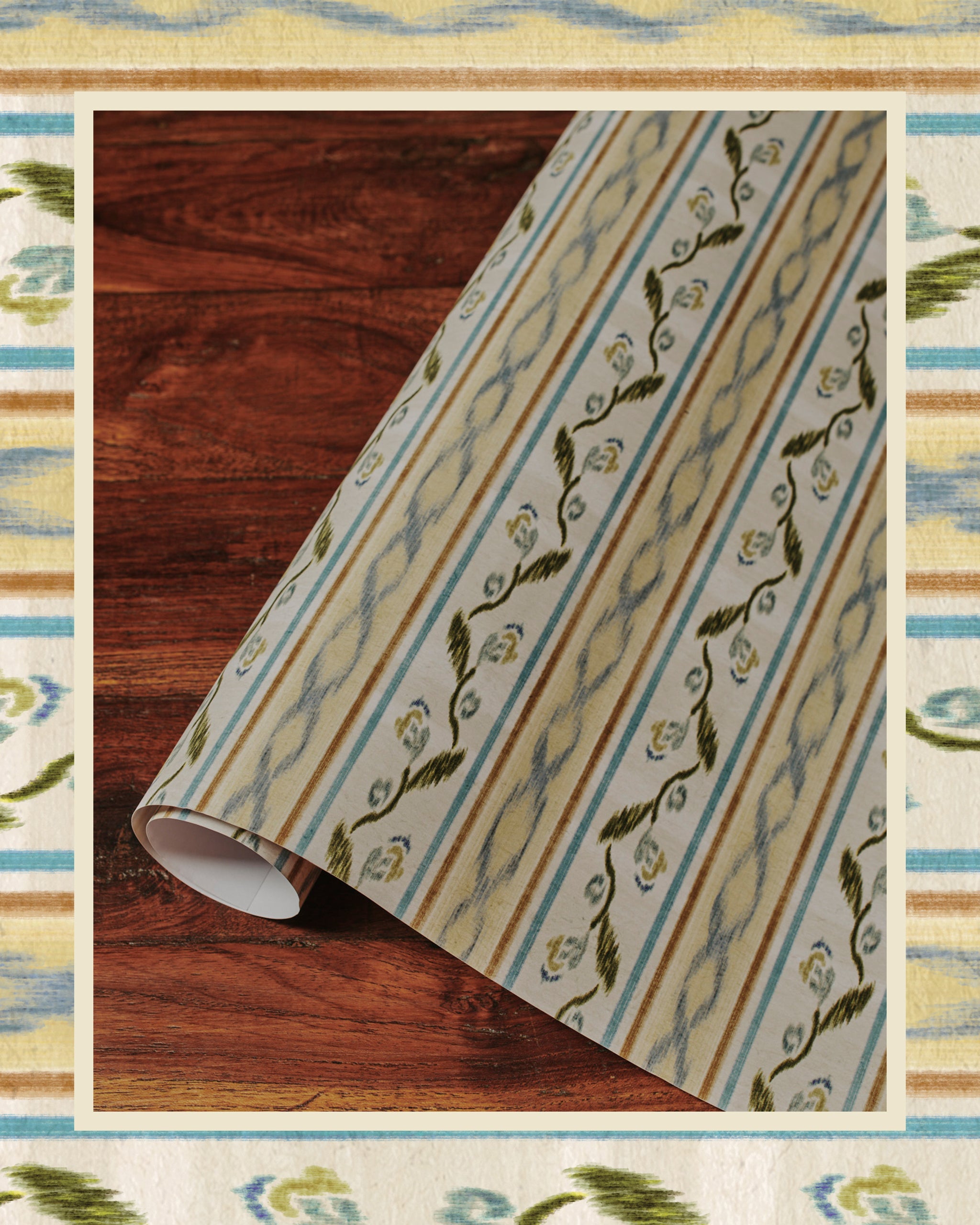 A rolled-up wrapping paper with an ikat pattern featuring geometric shapes and floral elements in a palette of blue, beige, and brown.
