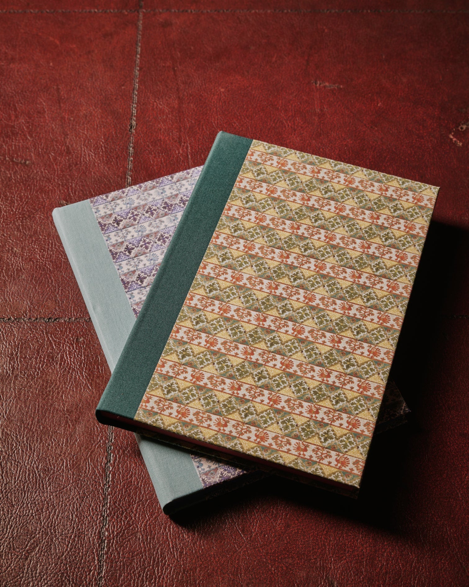 a group shot of The Kensington Paperie dacha notebook product