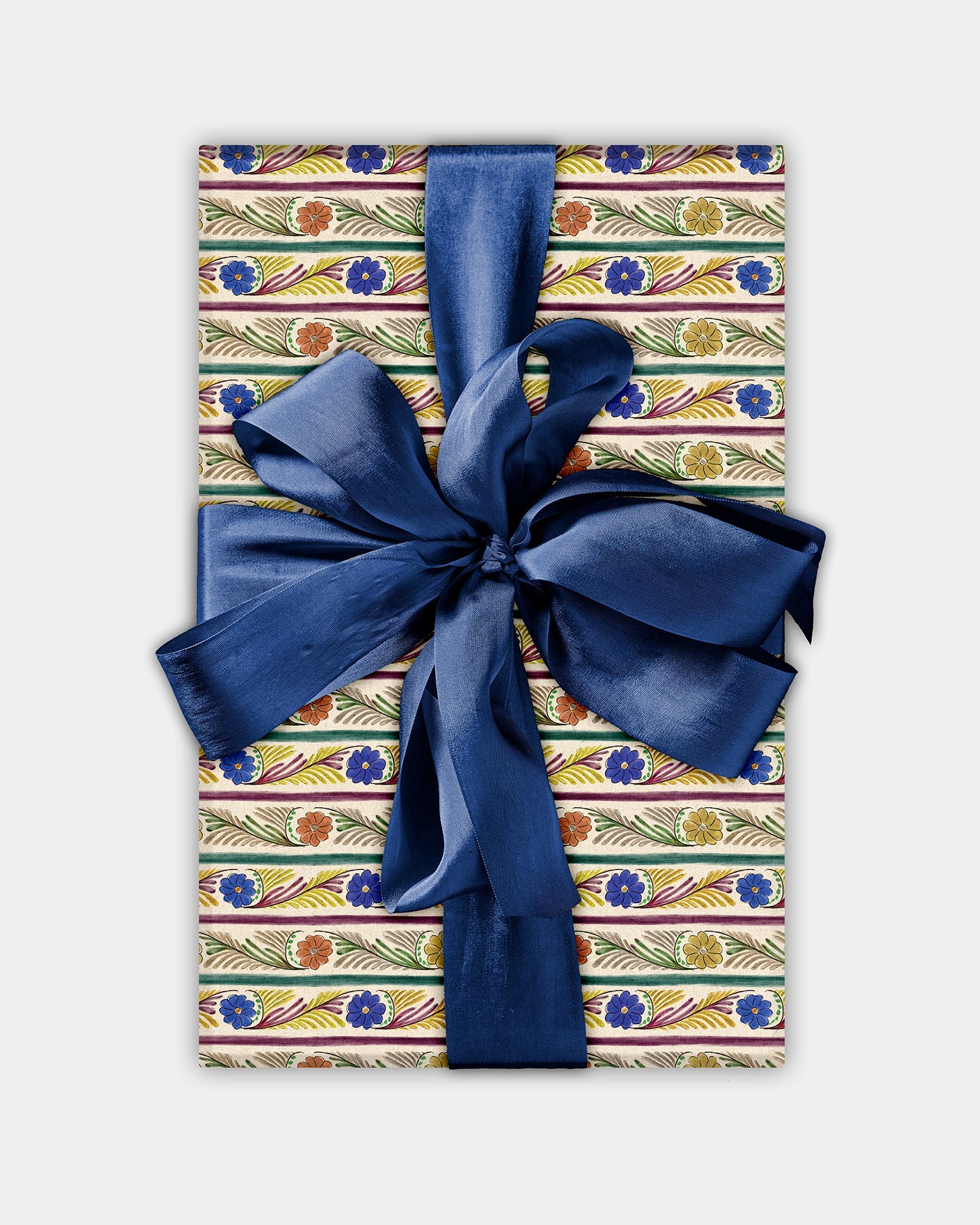 a shot of The Kensigton Paperie delft stripe wrapping paper product