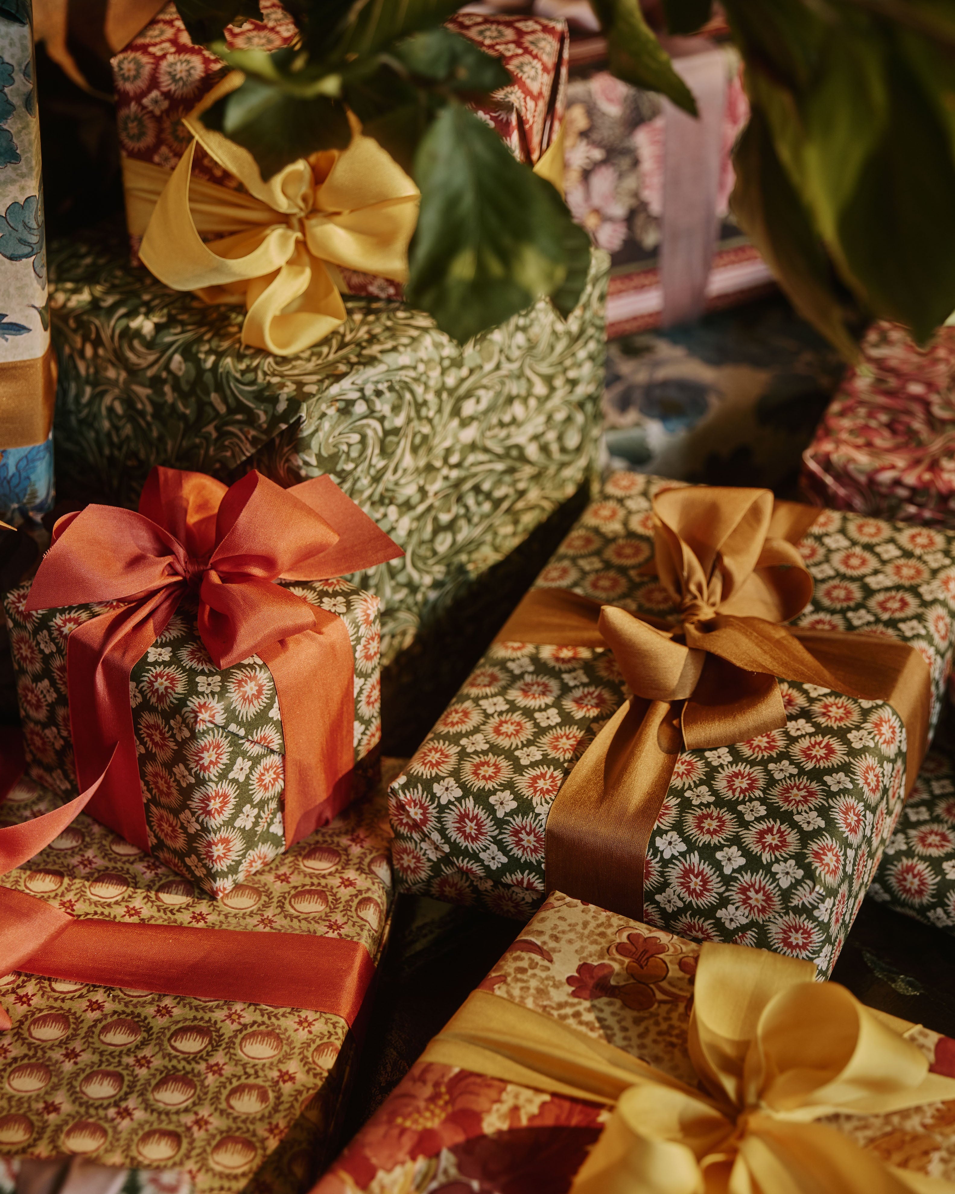 Gfts wrapped in The Kensington Paperie wrapping paper and tied with pure silk ribbon bows.