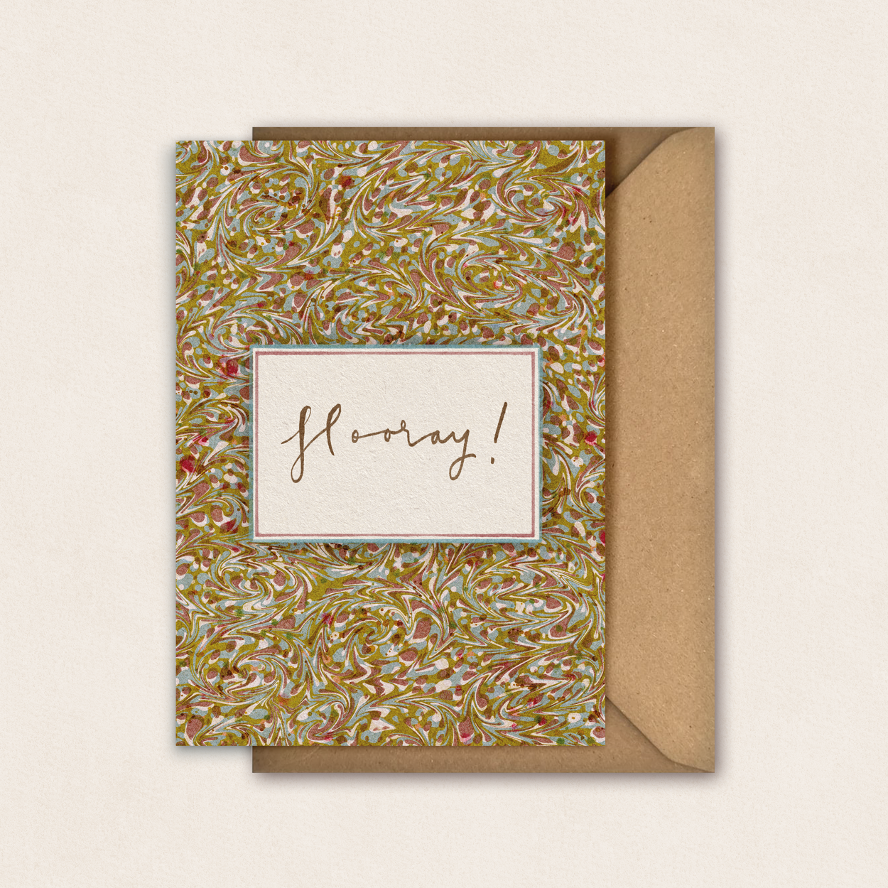 Greetings card with marble pattern and 'hooray!' text on a beige background