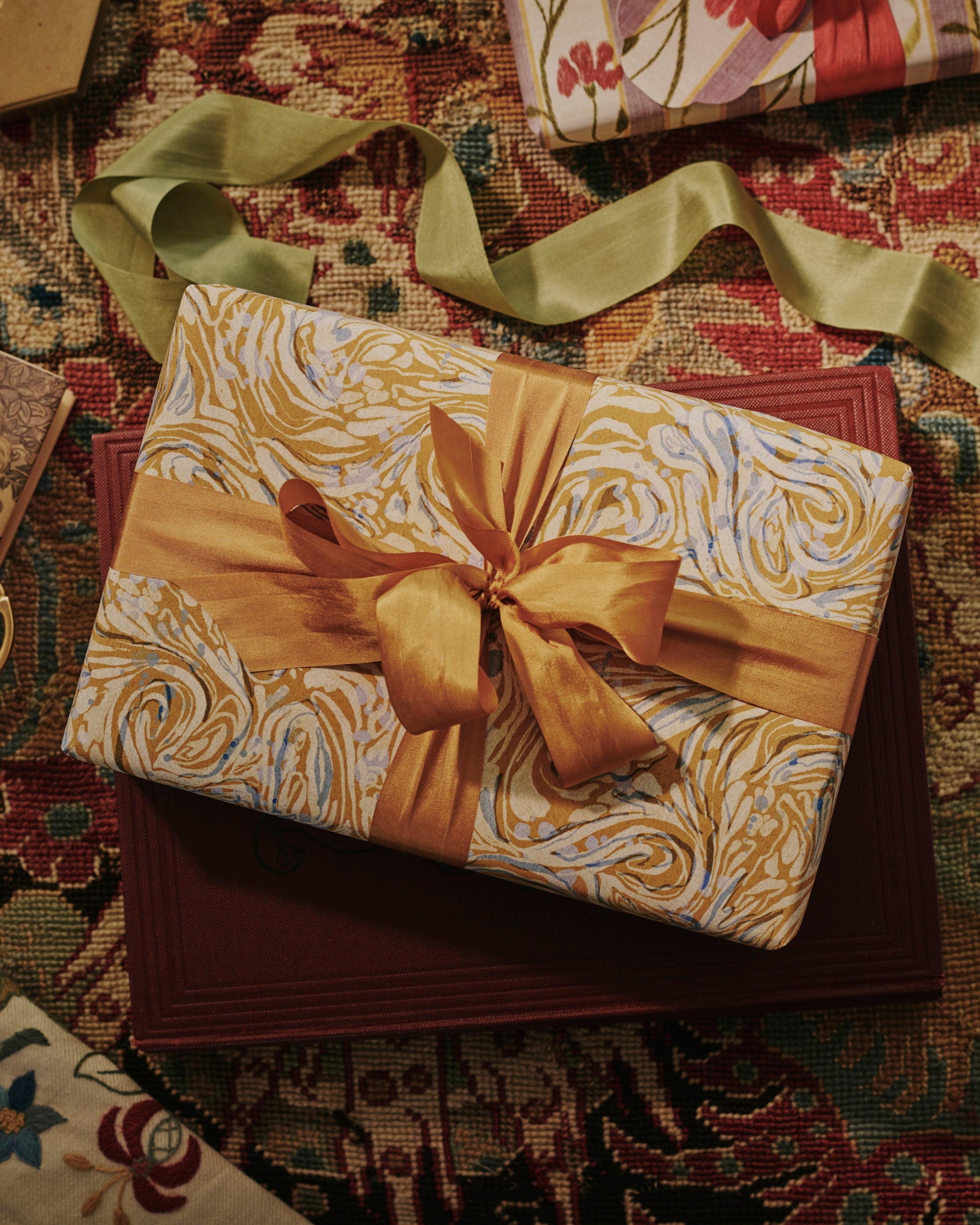 a shot of The Kensington Paperie marble mustard wrapping paper product